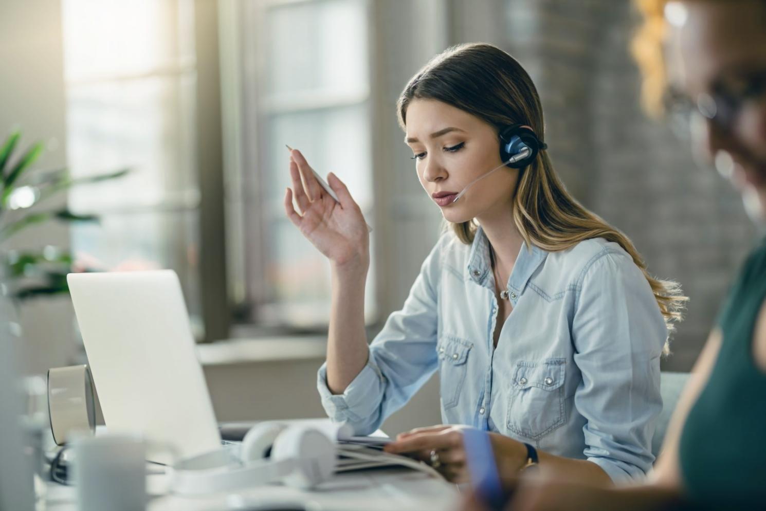 Team analyzing seasonal financial data on collaborative workspace